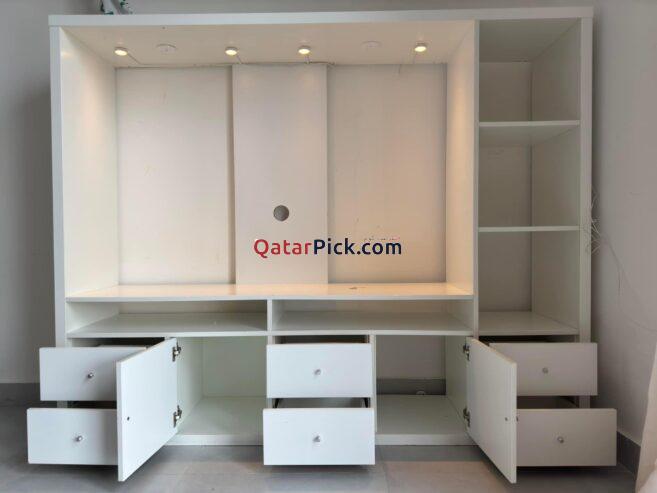 TV Ikea lappland with storage cabinet and light